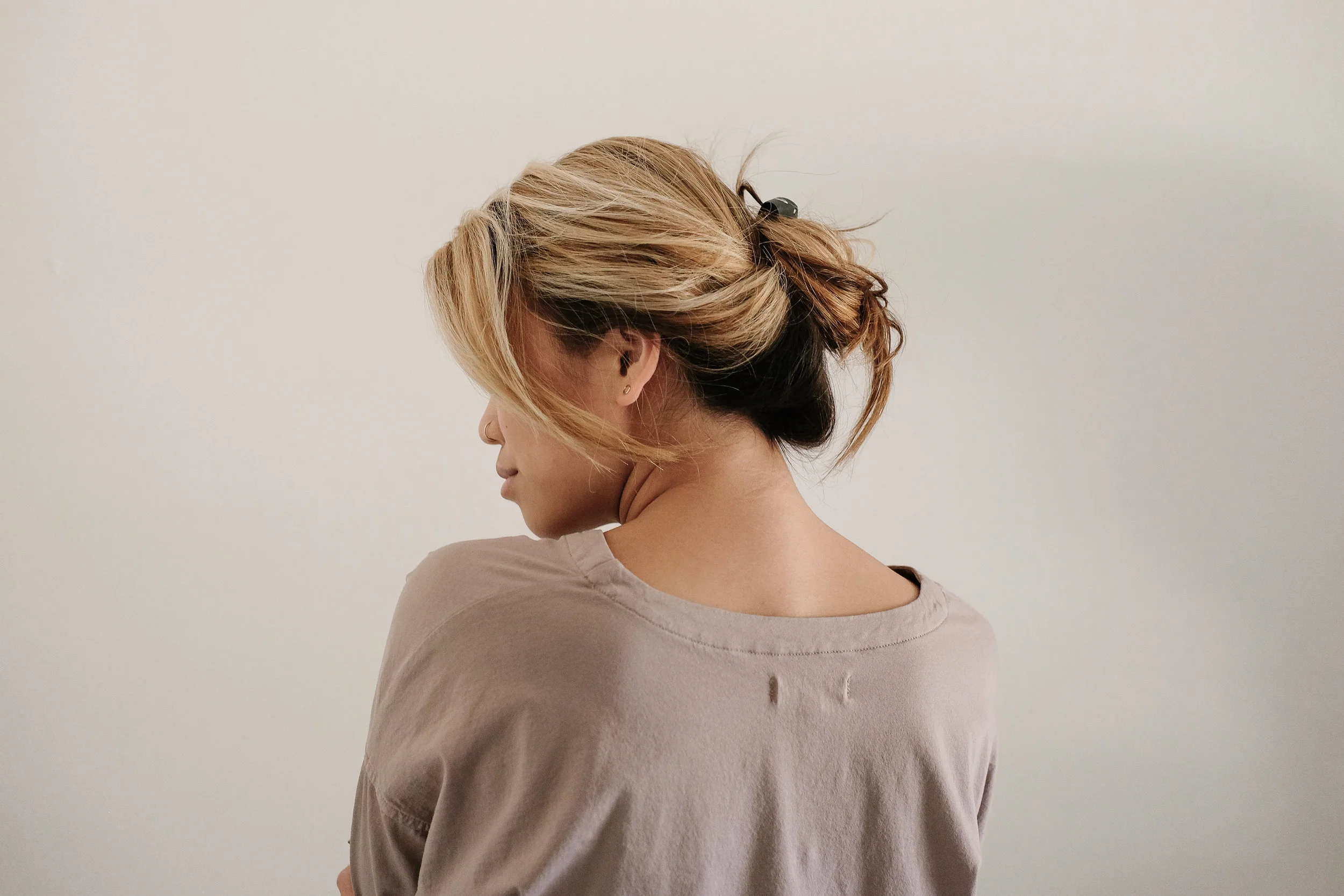 First: Sleep with your hair in a bun! This saves time later I promise. It doesn't matter what it looks like. It just keeps your hair from flattening out while you sleep!&nbsp;