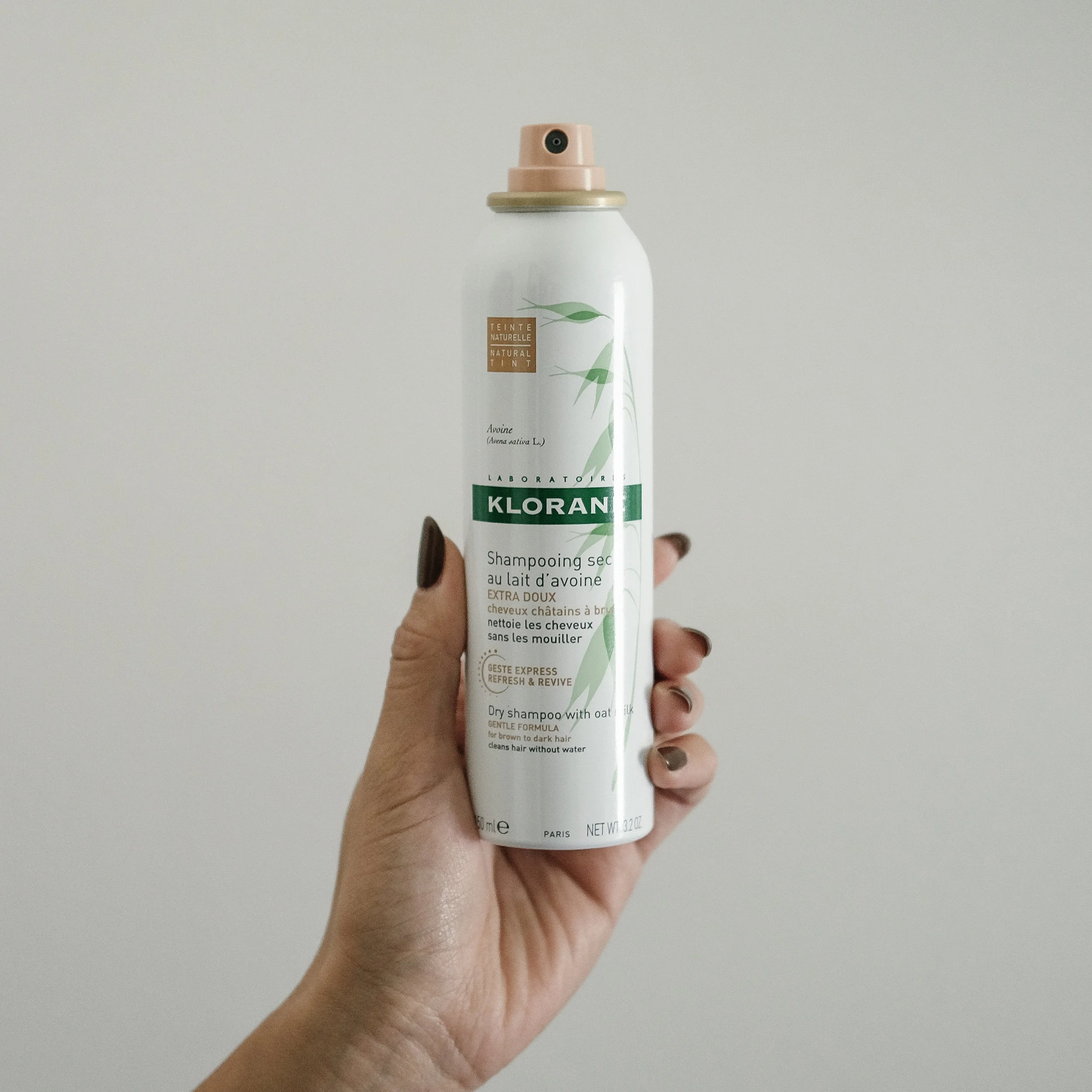 I like to use Klorane's Dry Shampoo with Oat Milk - Natural Tint, because of my dark roots. It doesn't spray in as white and turn your hair gray... yay!&nbsp;