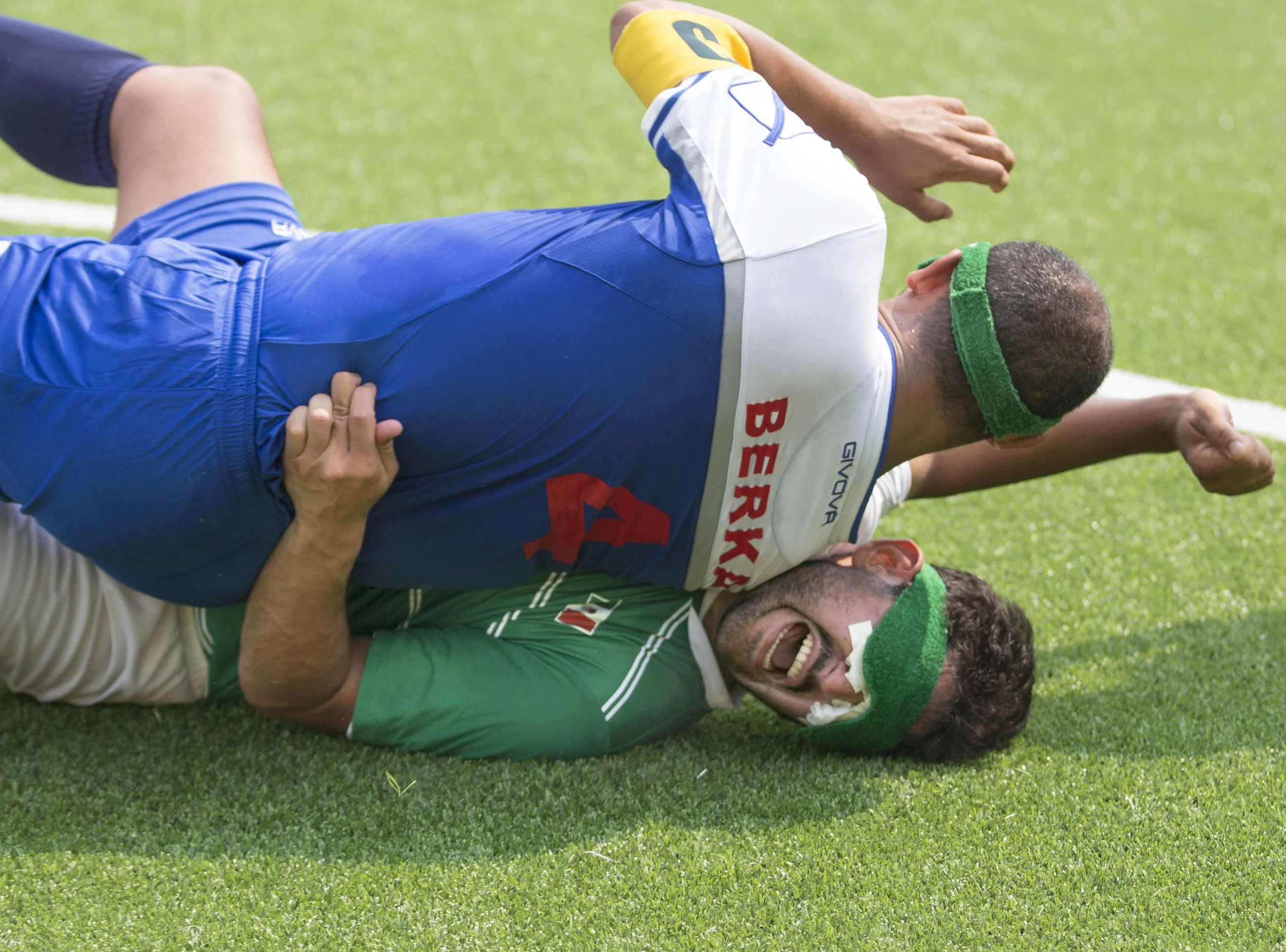 Mexican forward Jorge Lanzagorta gets flattened by Moroccan defender Imad Berka after the two collided while fighting for control of the ball in football five-a-side Thursday, Sept. 15, 2016, at the 2016 Paralympic Games. Mexico scored twice in the second half to win the game, 2-0.