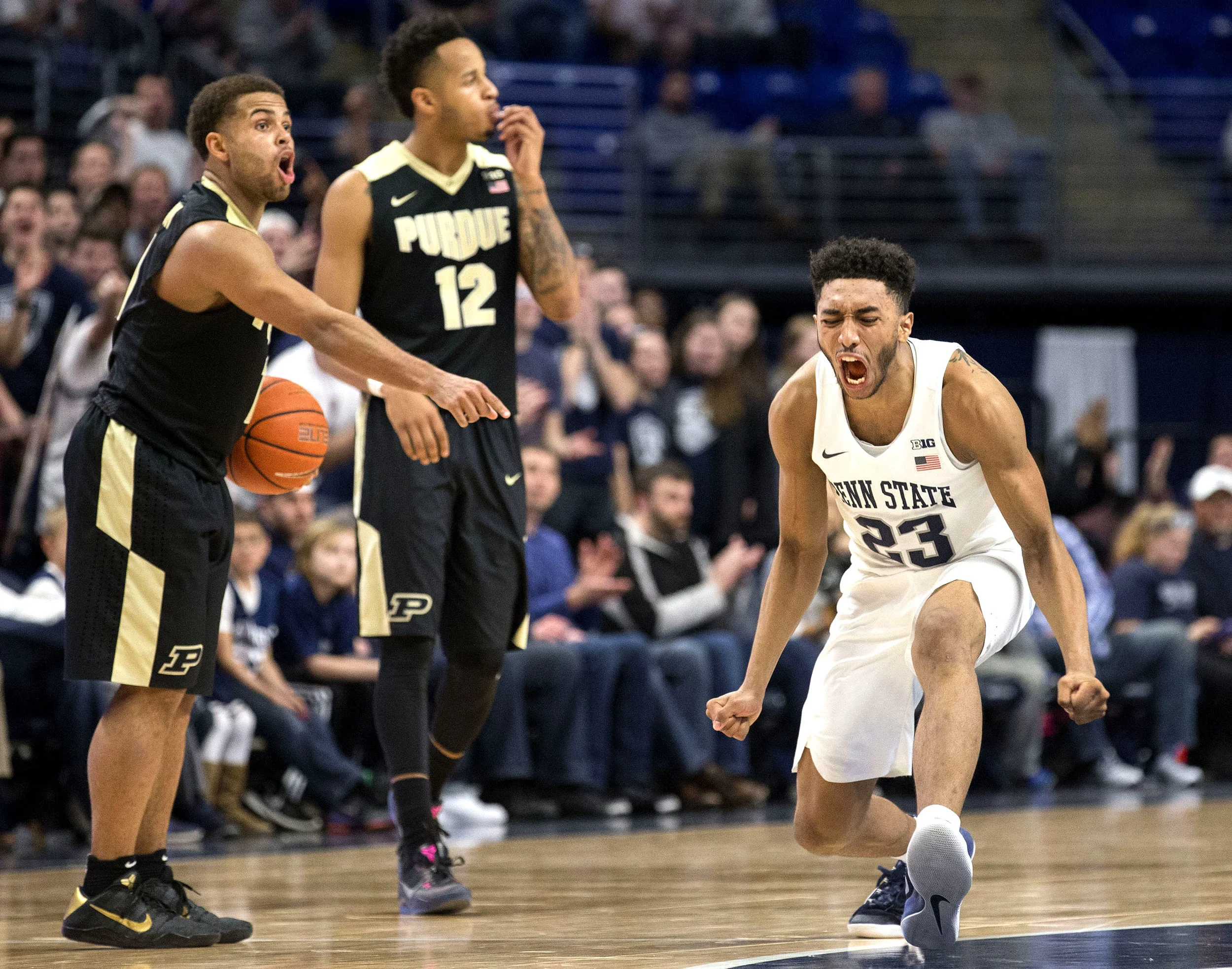 Penn State's Josh Reaves reacts after a call is made in Penn State’s favor during the men’s basketball game against Purdue. After heading to overtime, the Nittany Lions lost 74-70 at the Bryce Jordan Center on Tuesday, Feb. 21, 2017.
