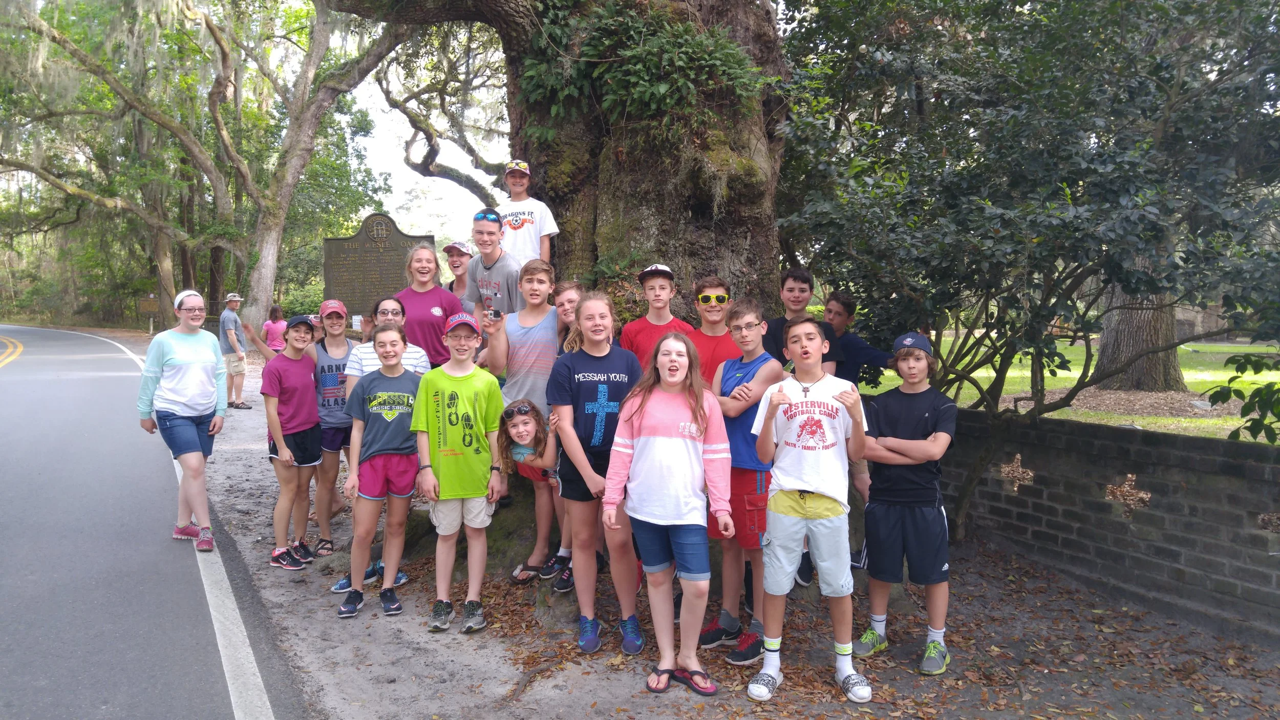 Group at the John Wesley Oak where islanders say the Rev. Wesley preached while in America.