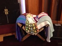 baby hats and afghans in manger.jpg