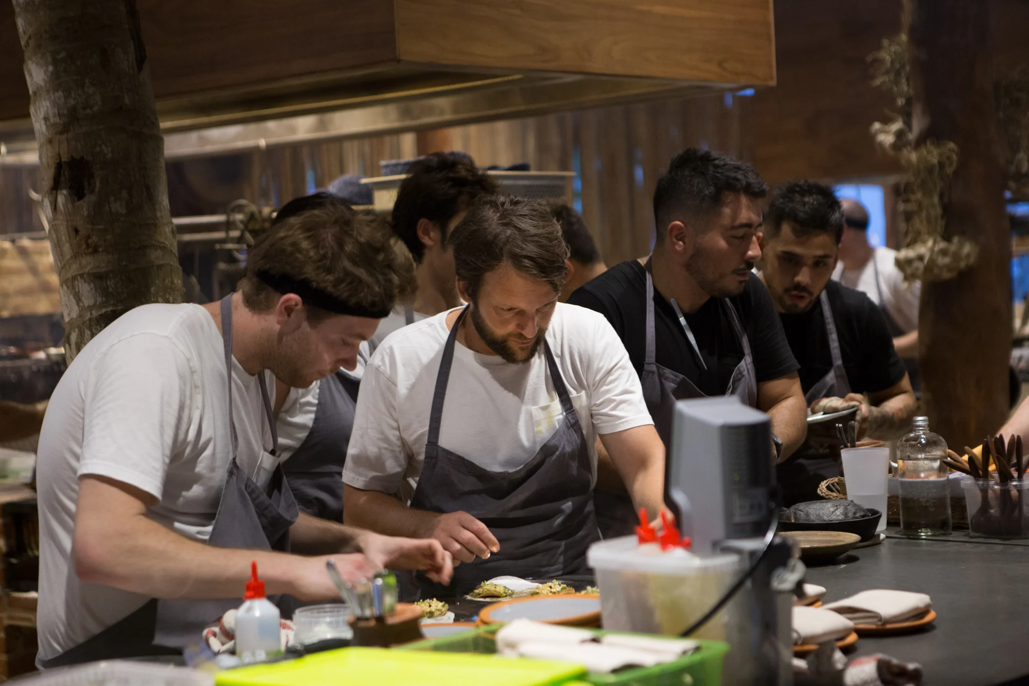René Redzepi and chefs in the kitchen at NOMA during dinner service