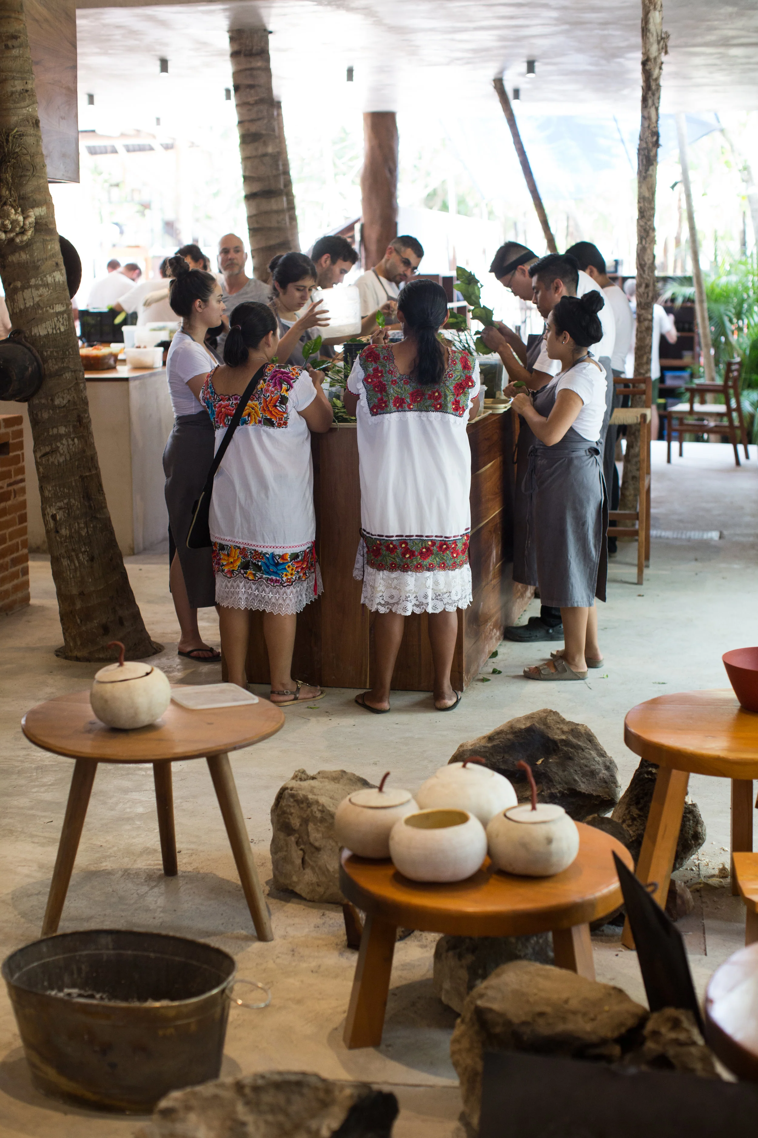 Staff preps for dinner service in the kitchen