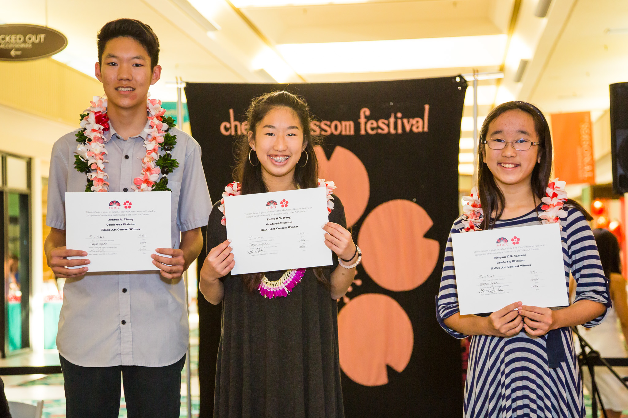 From left: Joshua Chung of Iolani School, Emily Wong of Iolani School, and Merynn Yamane of Kaneohe Elementary