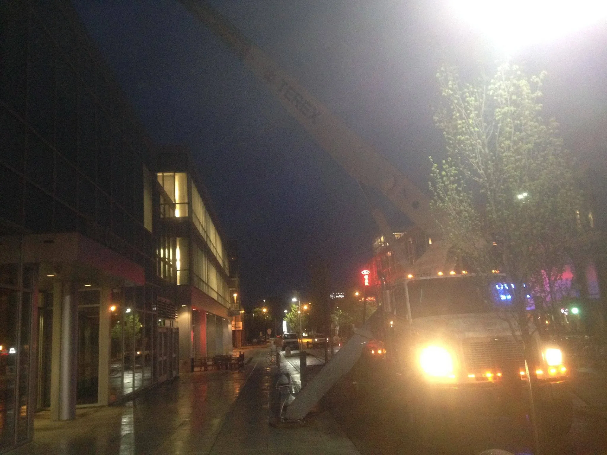 KnepCo Crane Services setting an HVAC unit in Columbus, IN.