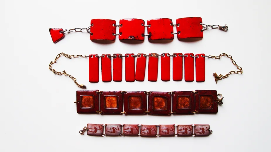  Old enamel on copper bracelets form the basis of my designs. 
