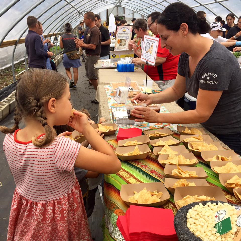 a happy taster at Allendale Farm Annual Tomato Festival.