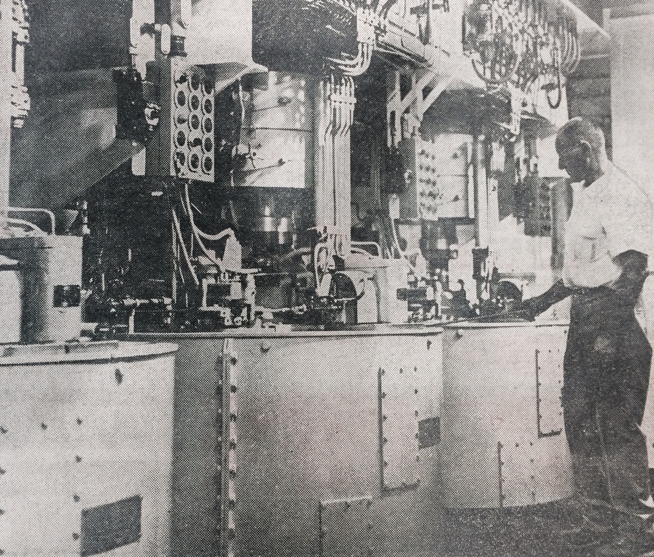 1965 - John strohauer watching over a centrifugal-force machine that separates wet sugar from molasses in the sugar beet factory.