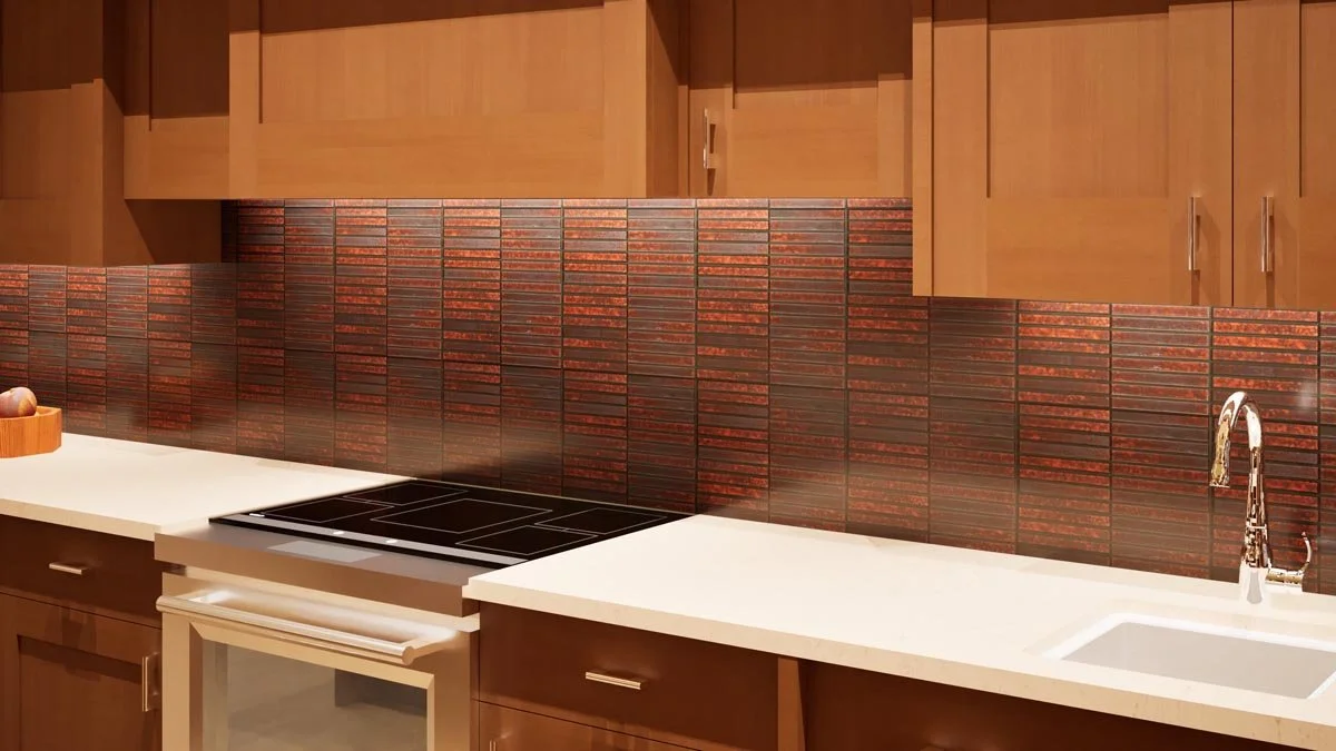  Close-up rendering of a kitchen counter with an induction range, white quartz countertop, undermount sink and a copper-toned vertical stacked tile backsplash. 