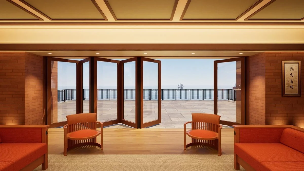   Rendering of a living room opening through folding glass doors onto a stone terrace overlooking Lake Michigan, with a sailboat on the horizon. 