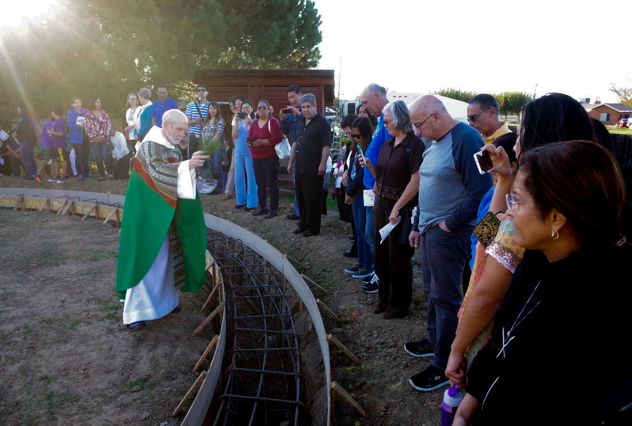 The Father blessed the footings and ground.