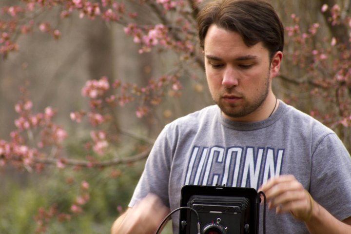 Pictured: Me using a camera I didn't own and never used professionally.
