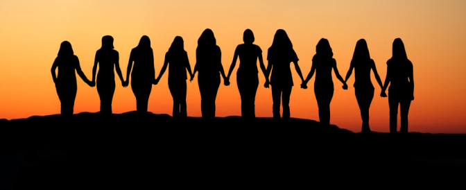 10-women-holding-hands-960x391-1422474333.jpeg
