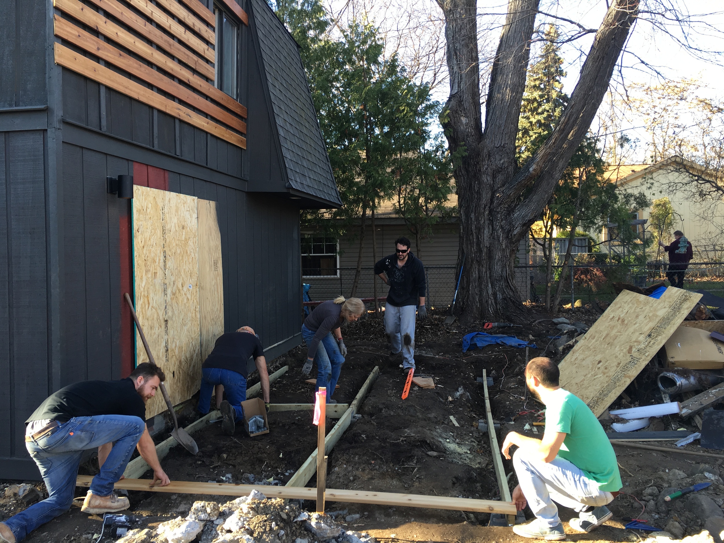 Deck Team. Not pictured: Blake. Pictured: our neighbor Wayne in the extreme background.