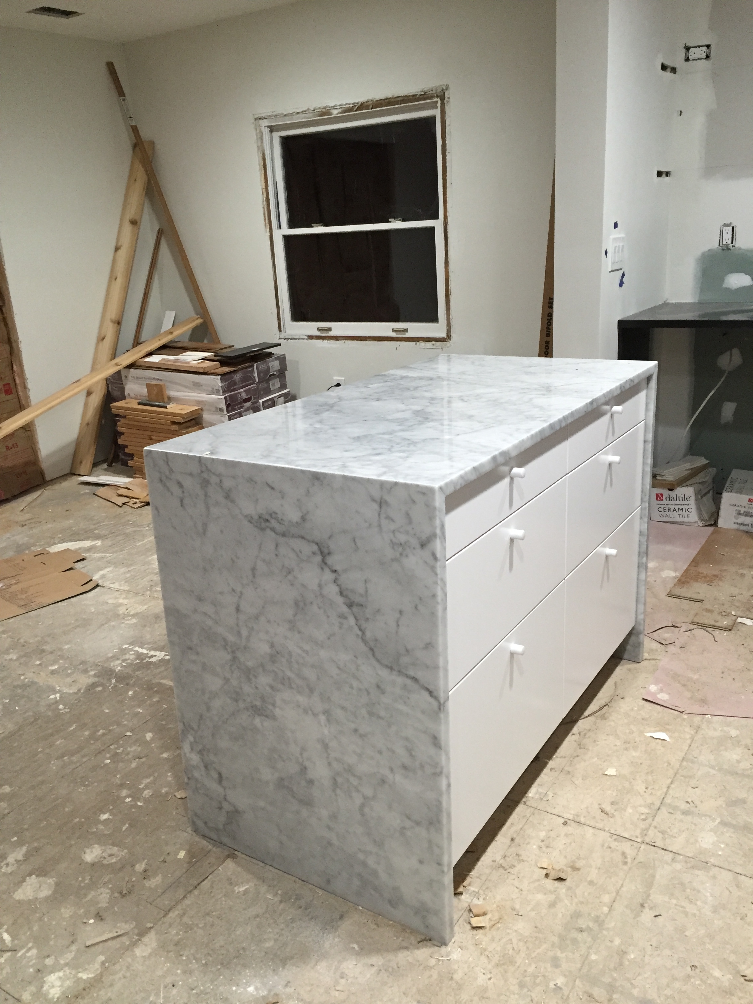 Super minimal pulls on the island drawers