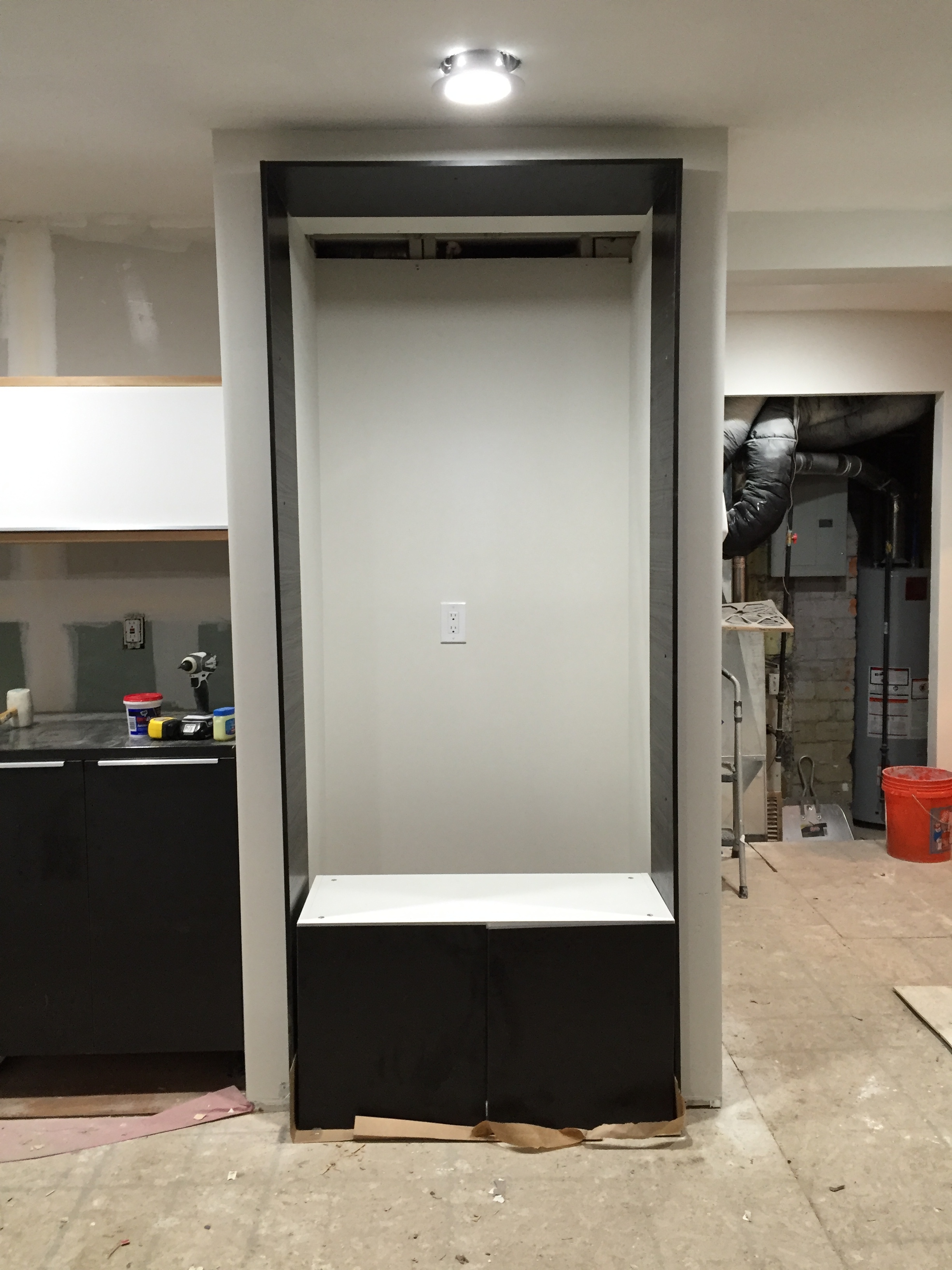 That cabinet on the floor will be above the refrigerator