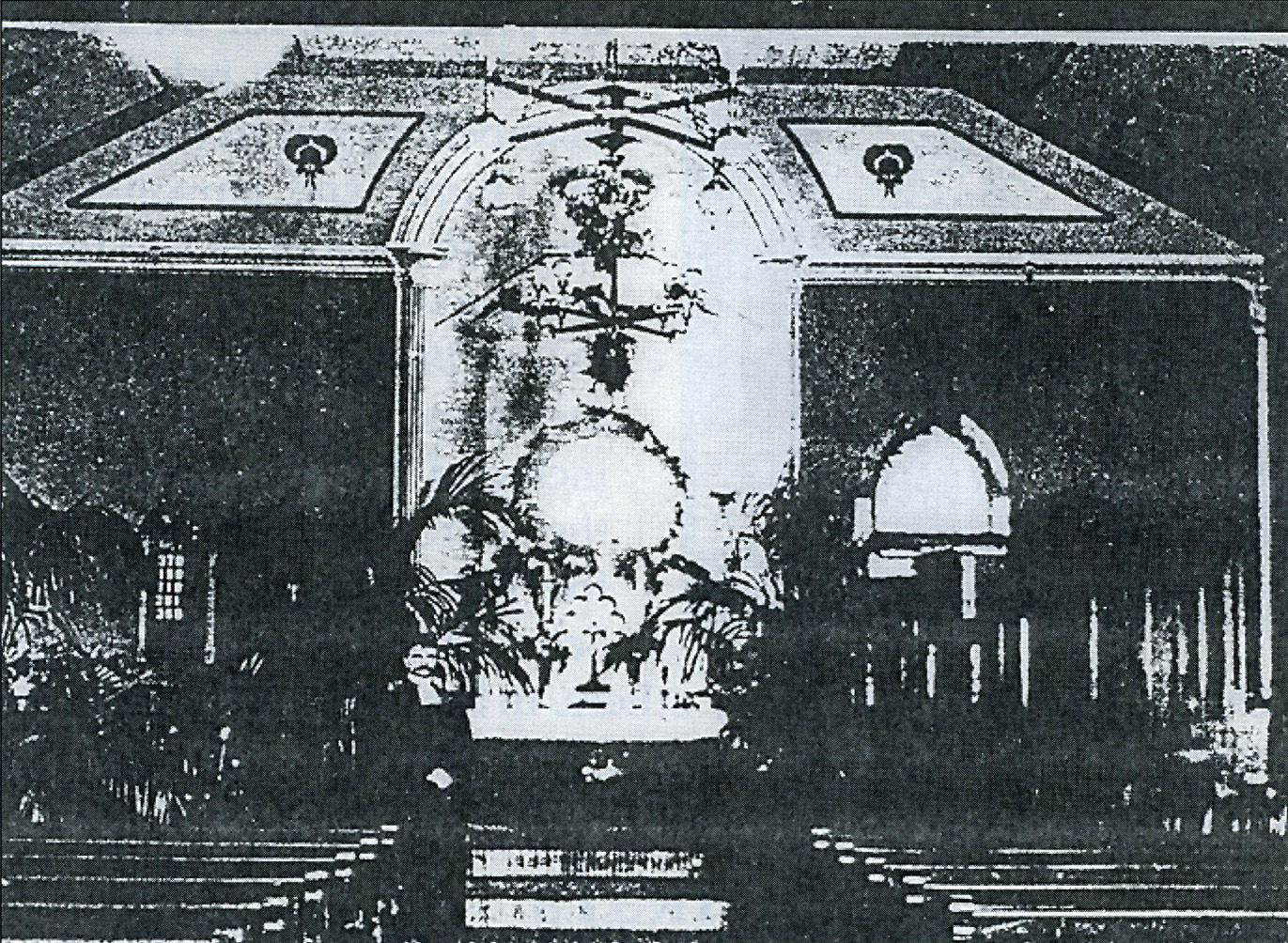 Picture, taken in 1914, of the early church interior with Pastor Schlick standing just left of center. Note the dark walls, the chandeliers, the Greek columns either side of the recessed alter, the pulpit on the right side (where later Carl Schmidt was to build a pipe organ with discarded parts salvaged from rebuilt organs) the window behind the pulpit indicating the parsonage had not yet been constructed, and the palms a symbol that the picture was taken during the Easter Season. Also! the early church was serviced by a reed organ that was pumped with the feet to build up air in the chambers, and when the keys where played - sound was generated. Bertha Oelschlager was organist for many many years prior to Carl Schmidt’s tenure which ended with his death in 1982.