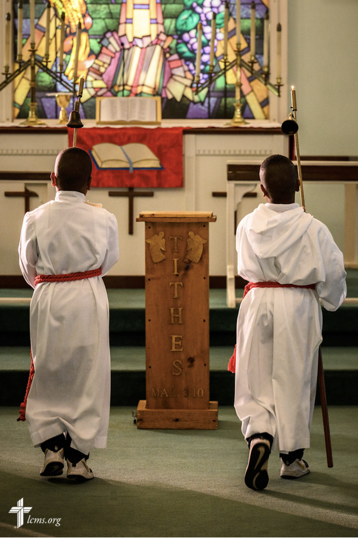   LCMS Lutherans in Black Ministry Family Convocation 2022 at Trinity Lutheran Church in Mobile, Ala.  Acolytes light the altar candles before Divine Service and during the LCMS Lutherans in Black Ministry Family Convocation 2022 on Wednesday, July 2
