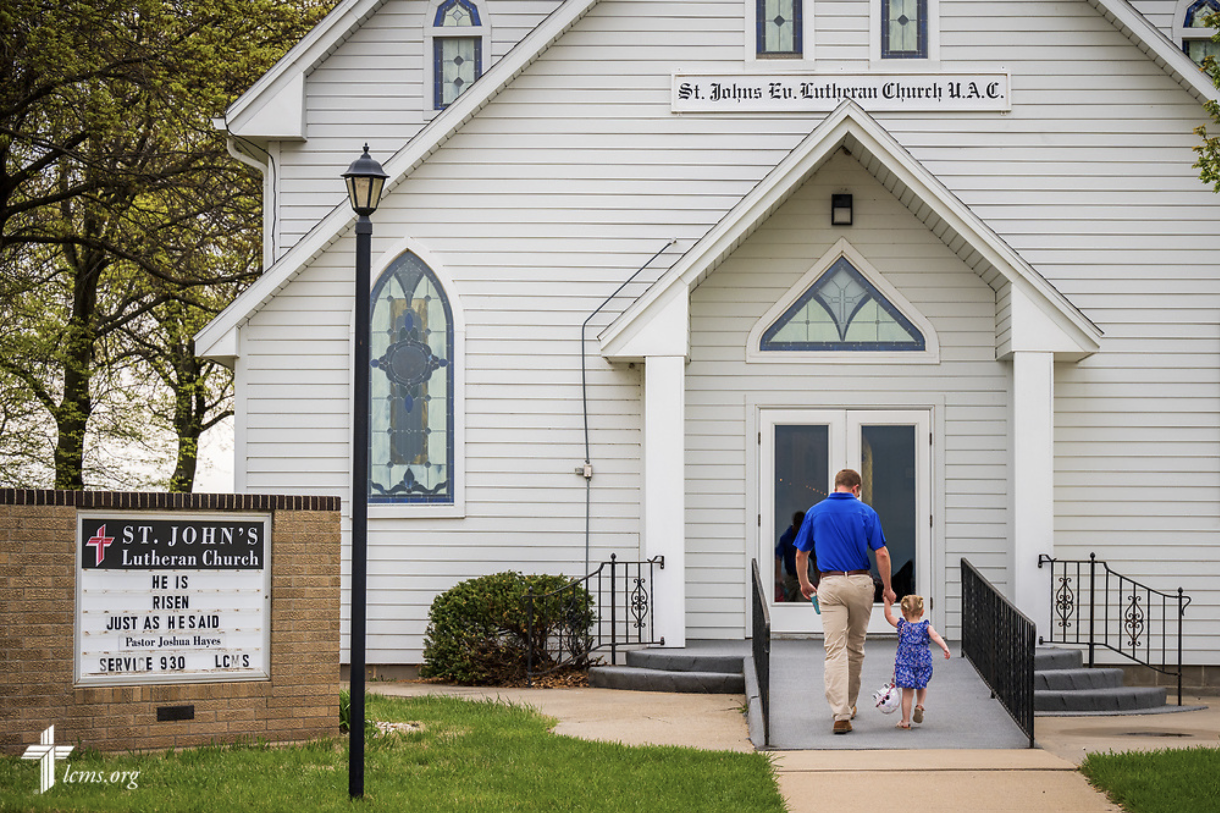   Divine Service at St. John Evangelical Lutheran Church, Palmer, Kansas.  A father and daughter arrive for Divine Service on Sunday, May 8, 2022, at St. John Evangelical Lutheran Church, Palmer, Kan. LCMS Communications/Erik M. Lunsford 