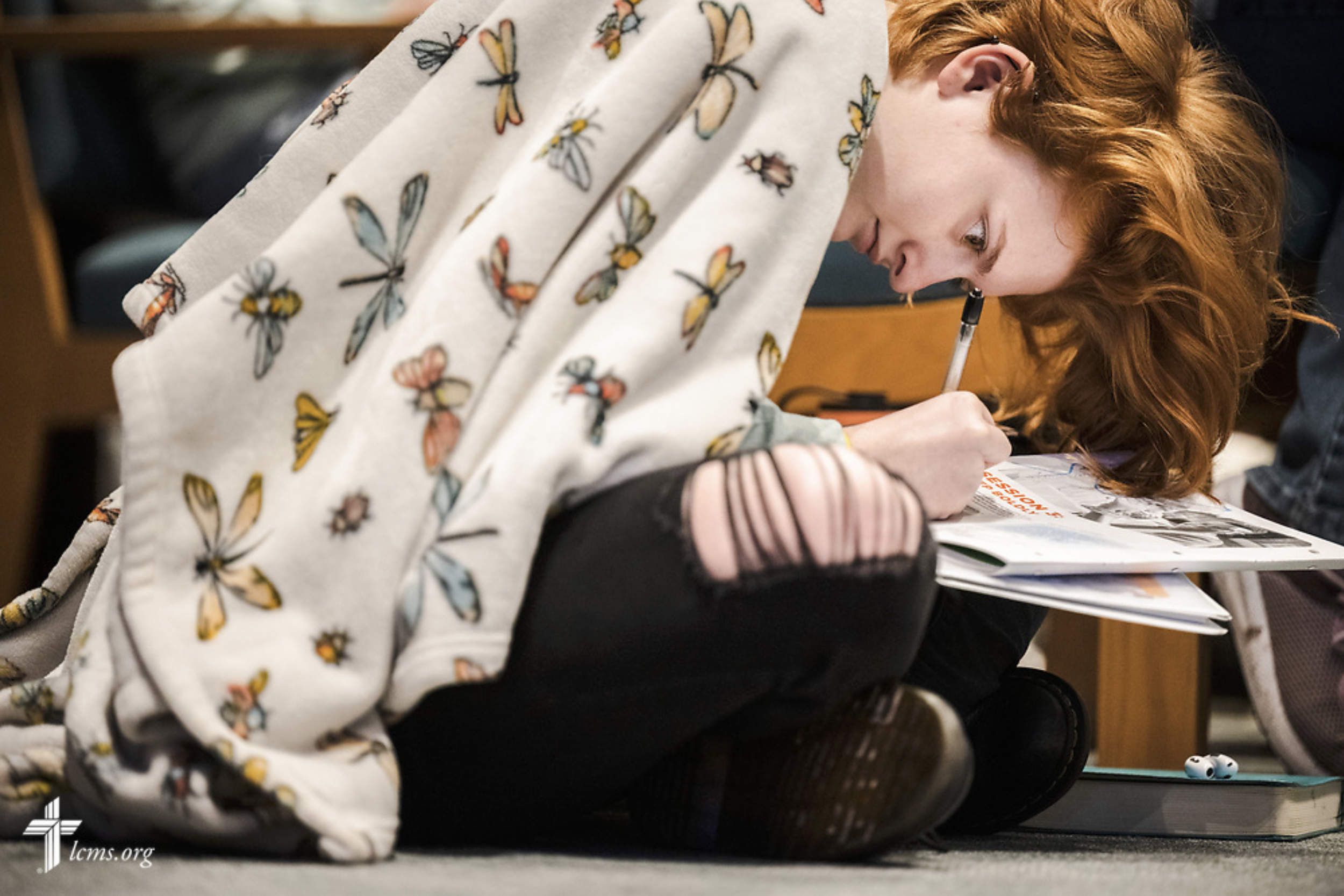   YouthLead in St. Louis  An attendee takes notes during YouthLead training on Saturday, March 19, 2022, at the Pallottine Renewal Center in St. Louis. LCMS Communications/Erik M. Lunsford 
