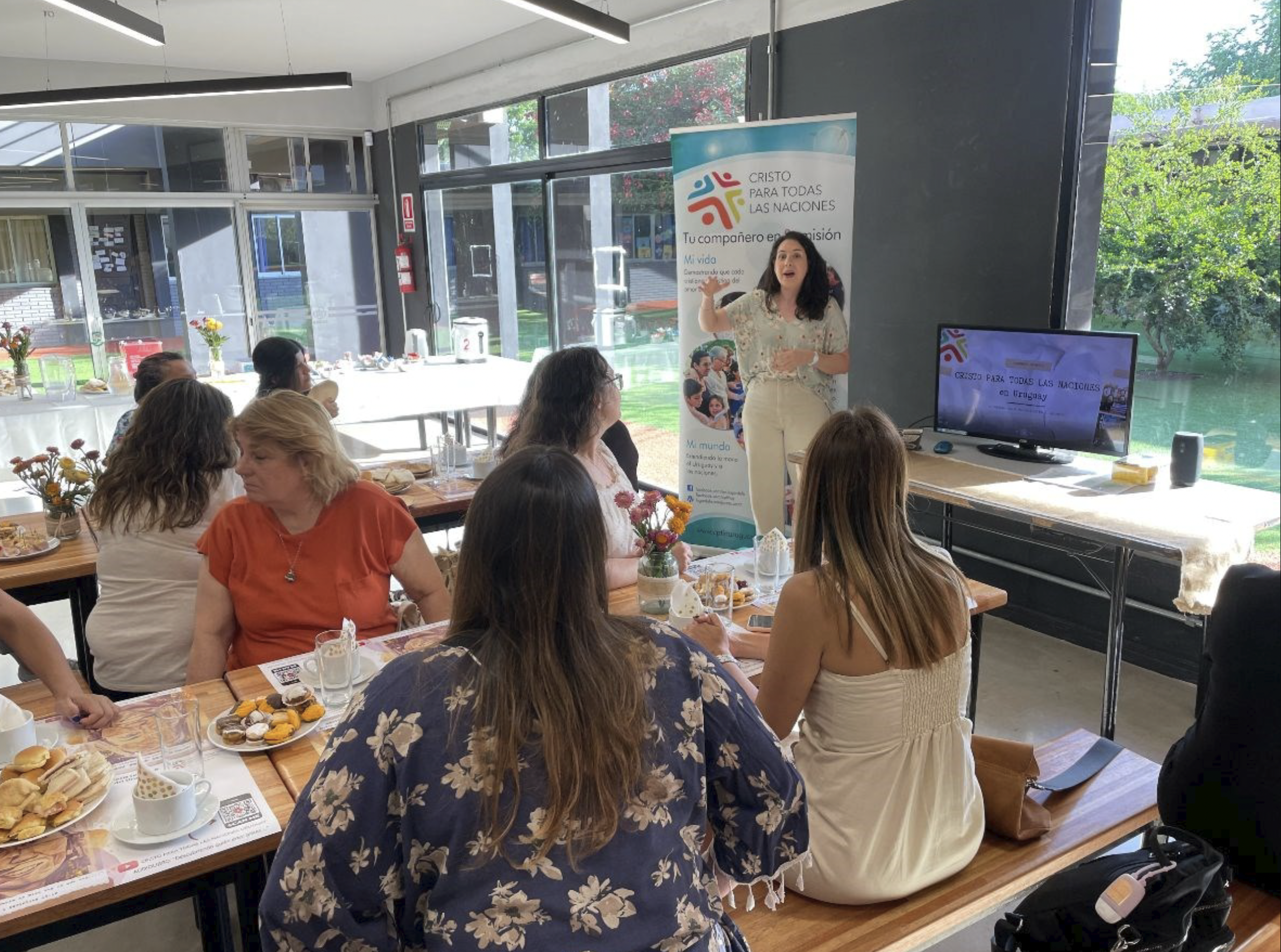   Cristo Para Todas Las Naciones- Uruguay director Gabi (future deaconess student) gave the welcome to the 40 women who attended the annual Ladies' Tea event at which we talked about Identity. Most of those in attendance are not members of the church