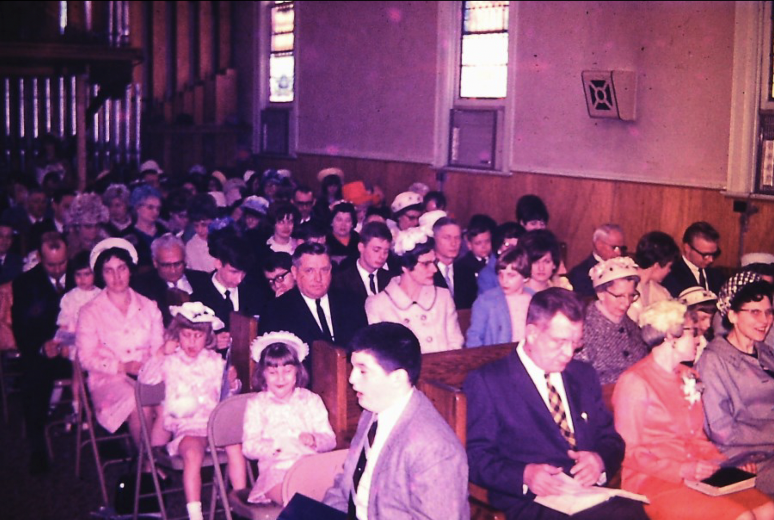  Worship in the "old church". Sunday best meant hats for ladies and suits for men.  