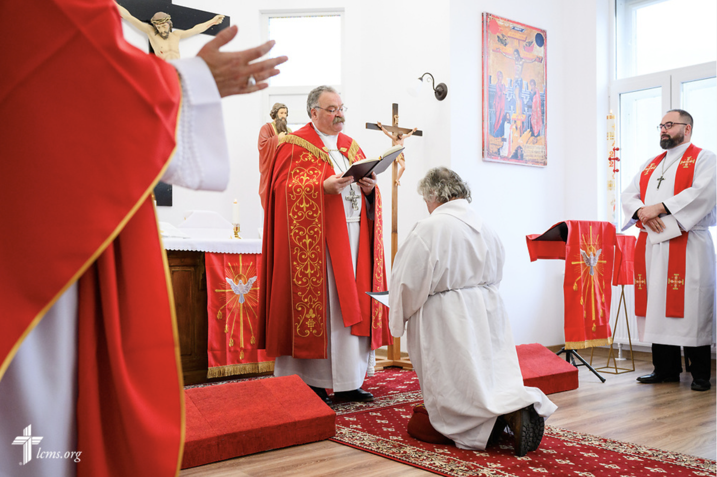  The Rev. Matthew C. Harrison, president of the LCMS, ordains the Rev. Arthur Bojinov of the Confessional Lutheran Church in Sofia, Bulgaria, during Divine Service at the Confessional Lutheran Church in Romania (Biserica Lutherană Confesională din Ro