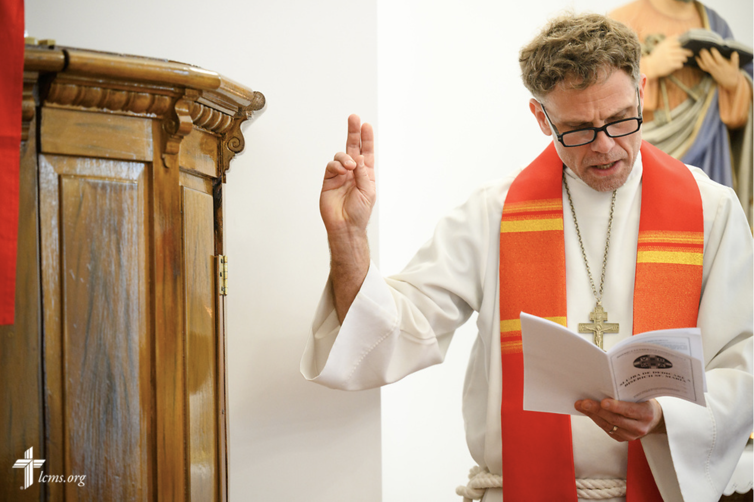  The Rev. Dr. David Preus, LCMS missionary, serves in the dedication during Divine Service at the Confessional Lutheran Church in Romania (Biserica Lutherană Confesională din România) St. Mary's Lutheran Center on Sunday, Feb. 18, 2024, in Brașov, Ro