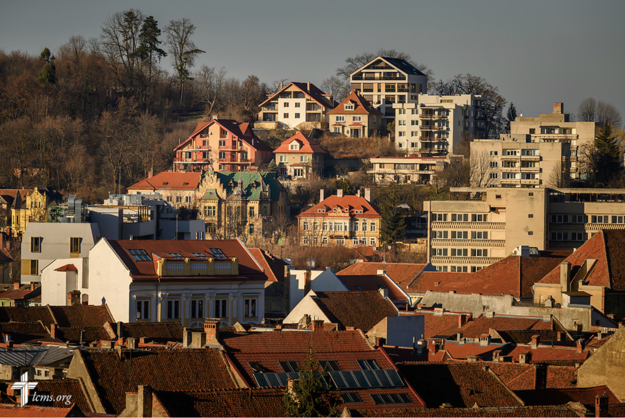  The St. Mary's Lutheran Center, seen with the green roof on the hillside, on Saturday, Feb. 17, 2024, in Brașov, Romania. LCMS Communications/Erik M. Lunsford 