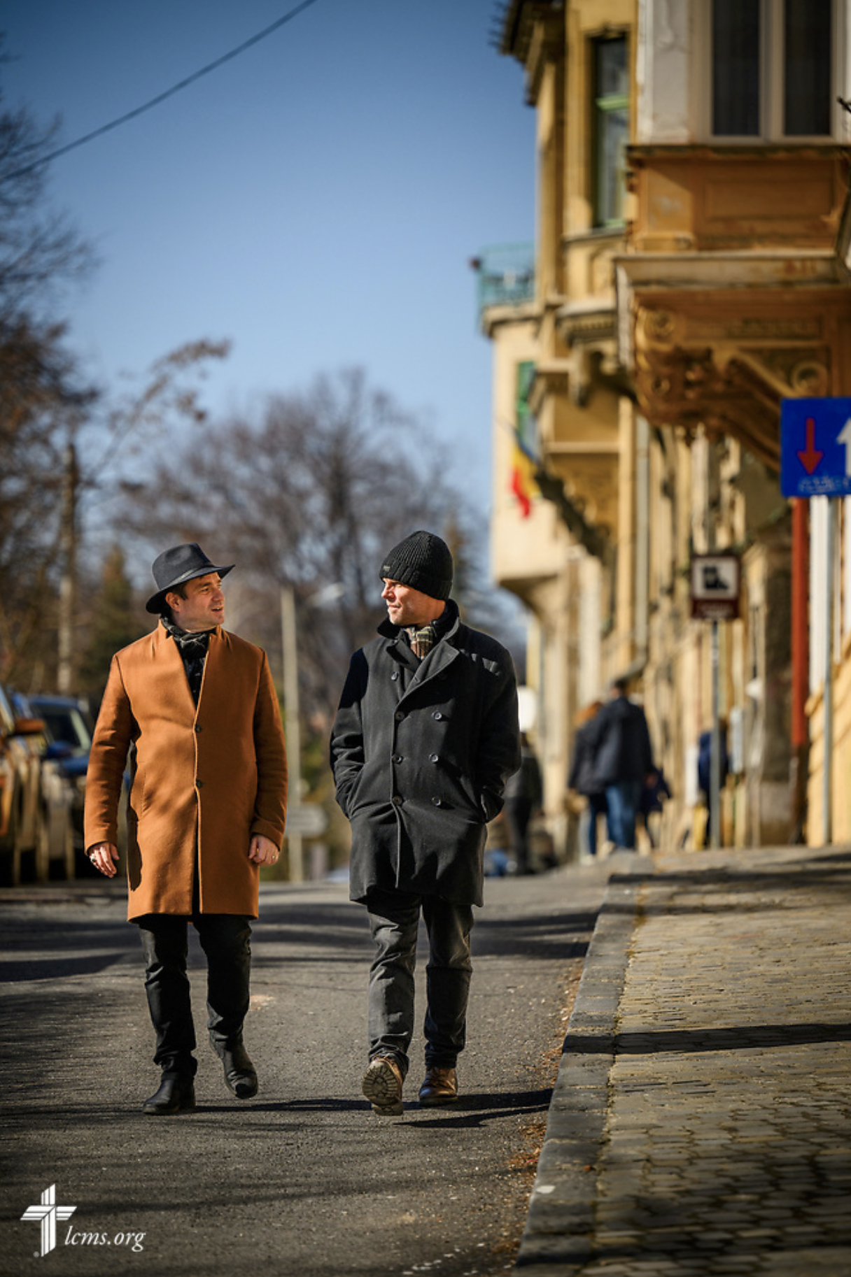  The Rev. Sorin Horia Trifa, LCMS alliance missionary and pastor in the Confessional Lutheran Church in Romania (Biserica Lutherană Confesională din România), talks with the Rev. Dr. David Preus, LCMS missionary, on Saturday, Feb. 17, 2024, outside t