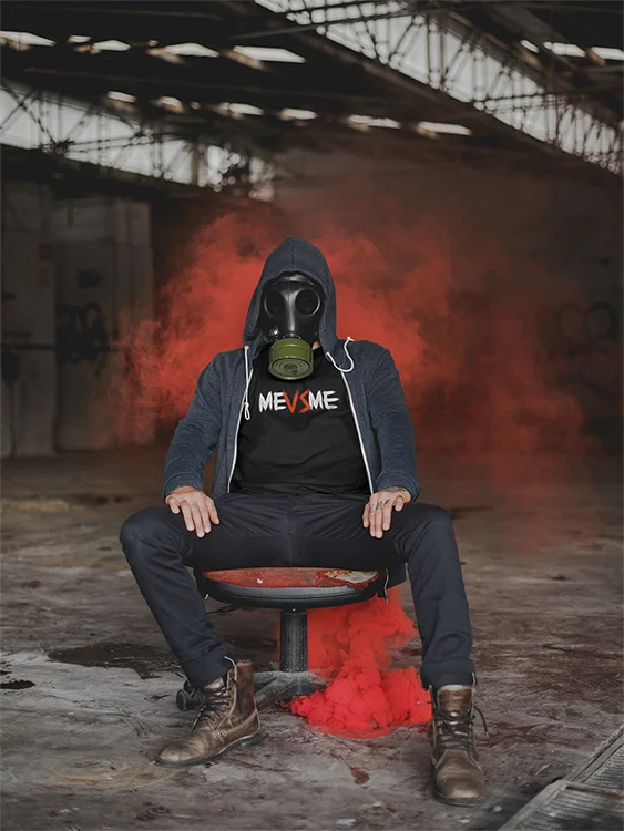 t-shirt-mockup-of-a-man-with-a-gas-mask-sitting-near-red-smoke-22946.jpg