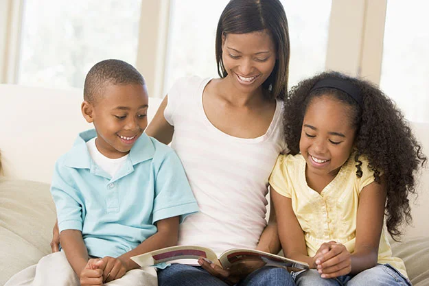 bigstock-Woman-And-Two-Children-Sitting 625.jpg