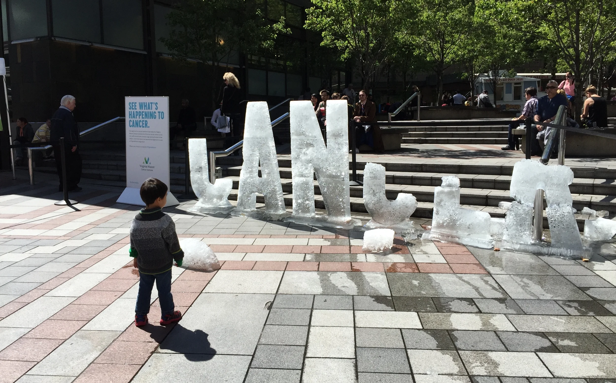 Ice sculpture of the word CANCER that melted away over a single day. A powerful message for those affected by the disease who came across the sculpture. 
