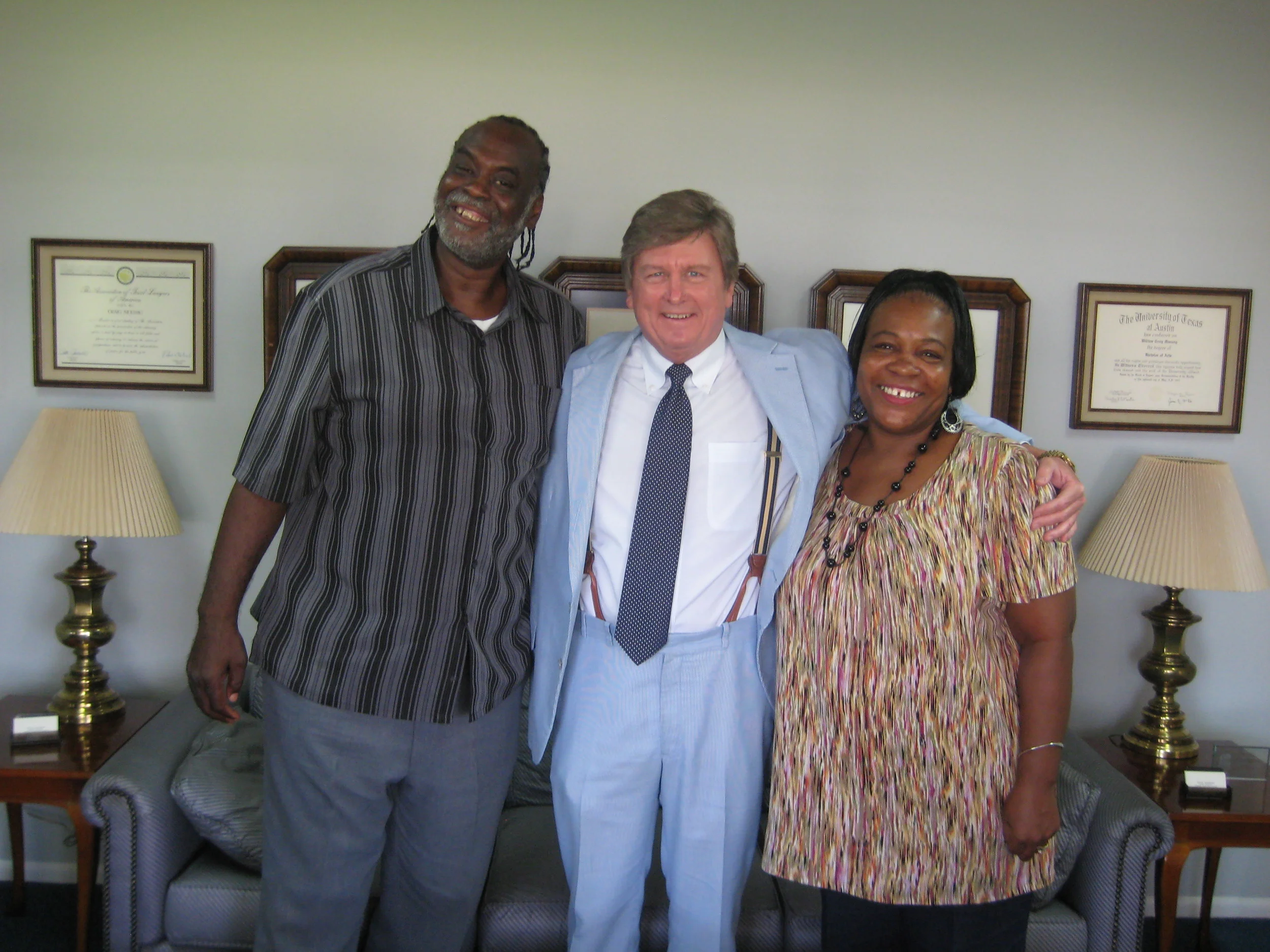 After a long battle with two major insurance companies, Muessig is pictured celebrating a $500,000 settlement with his client Bobby Robinson and his wife Andrea. Robinson was injured in a Katy auto accident and underwent successful neck surgery. 