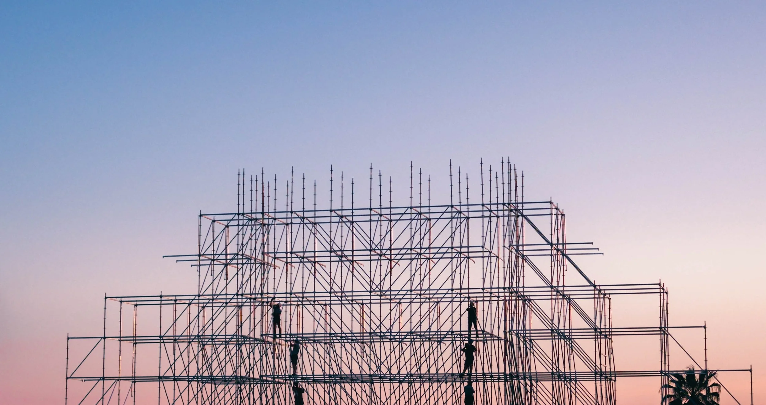 Construction workers on structure - digital forms empower field teams to seamlessly capture, route, and process job site data