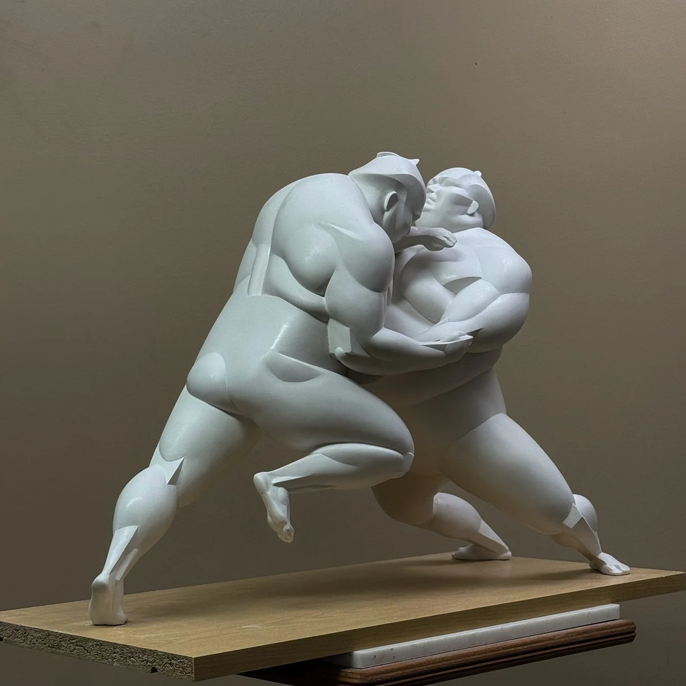 Sumo wrestlers, 20 1/2" x 9" x 14 1/4"