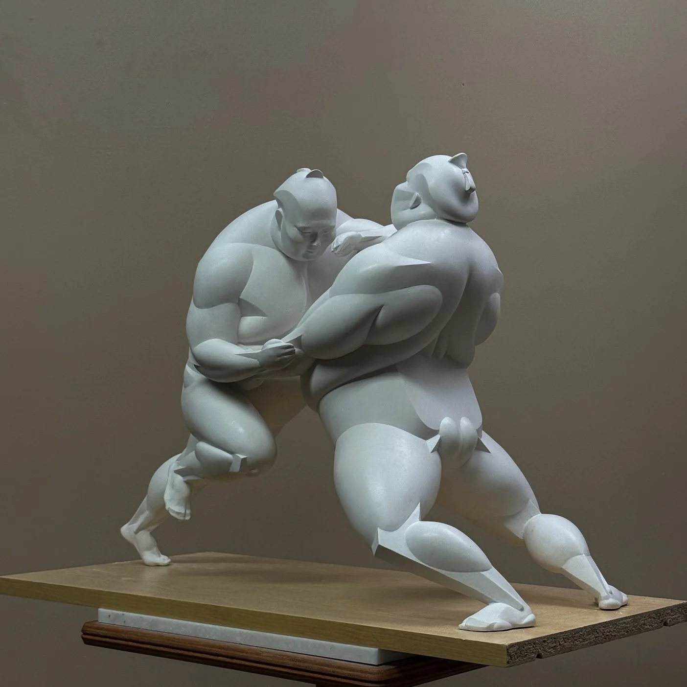 Sumo wrestlers, 20 1/2" x 9" x 14 1/4"