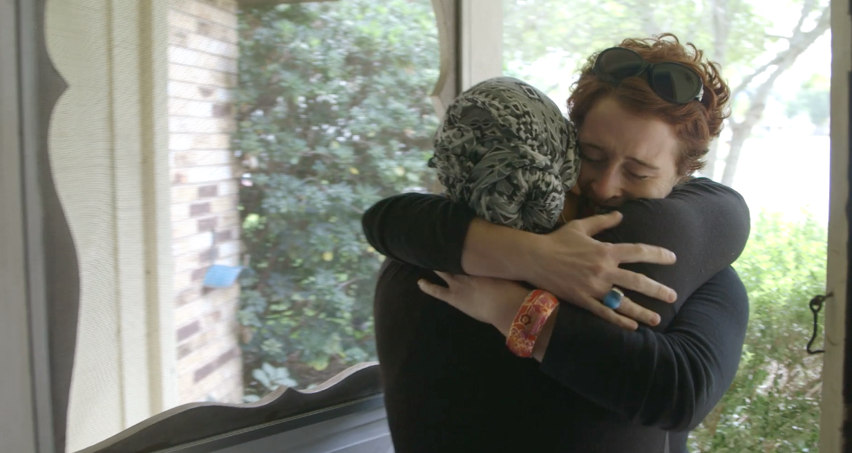 L and Fiona Hugging.png
