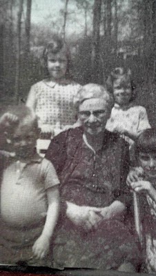 My beloved Grandma Catie. She was an Irish immigrant and tremendously faithful woman. That's me, behind her on the left. 