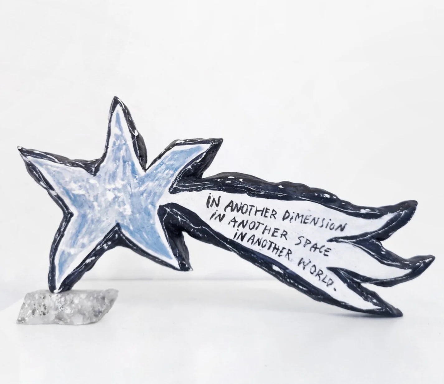   I'll See You Again  (2019). Raw moonstone, acrylic, markers, clay. 