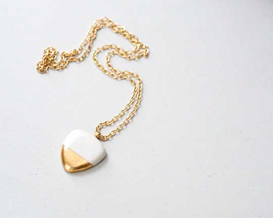 Biomorphic Pebble Necklace, porcelain, 22k gold, shiny brass chain, $150