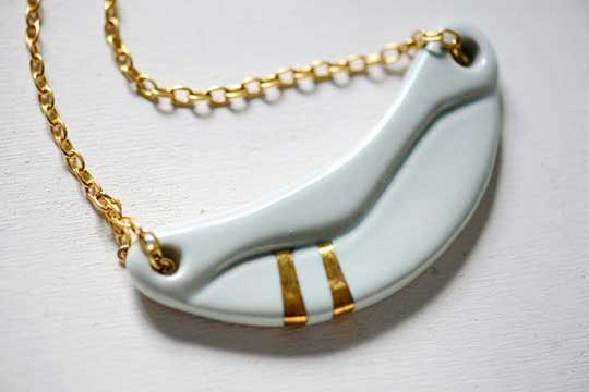 Sculpture Wave Neclace, porcelain 22k gold, shiny brass chain, $245