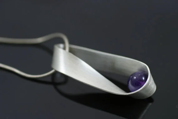 Mobius necklace, sterling silver and amethyst, $110