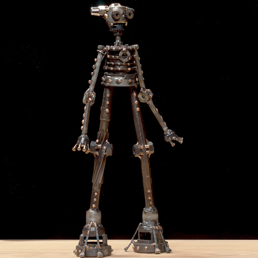 Bibi #322 , Ion-class astrobot, bicycle parts, socket heads, punch, reamer, rivets, nuts, acorn nuts, bolts, rod clamp, flooring nails, copper, bronze, 15" x 8" x 3", sold