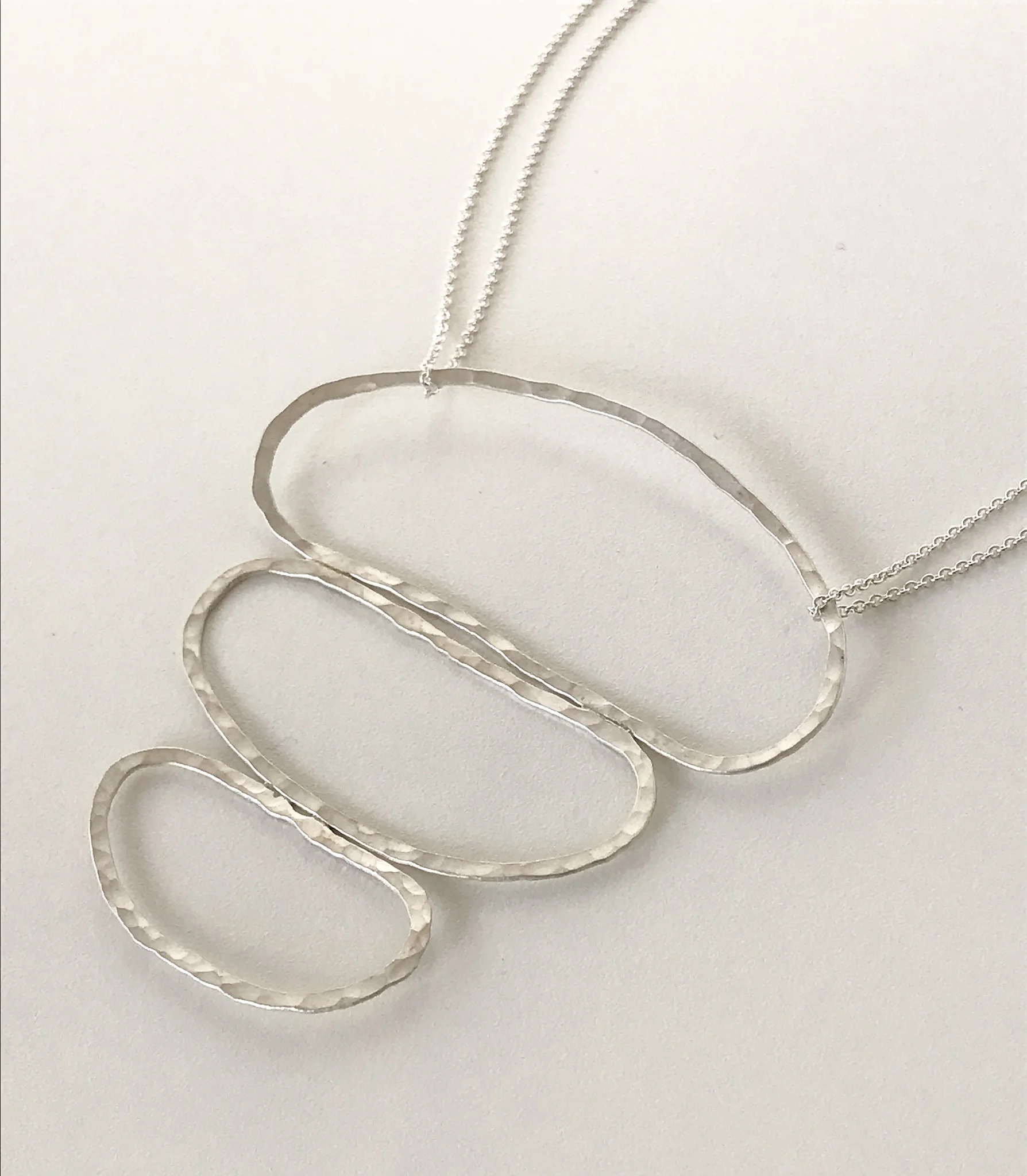 Hammered groovy ovals necklace, sterling silver, pendant 3 1/2" x 3", chain 15 1/2", $125