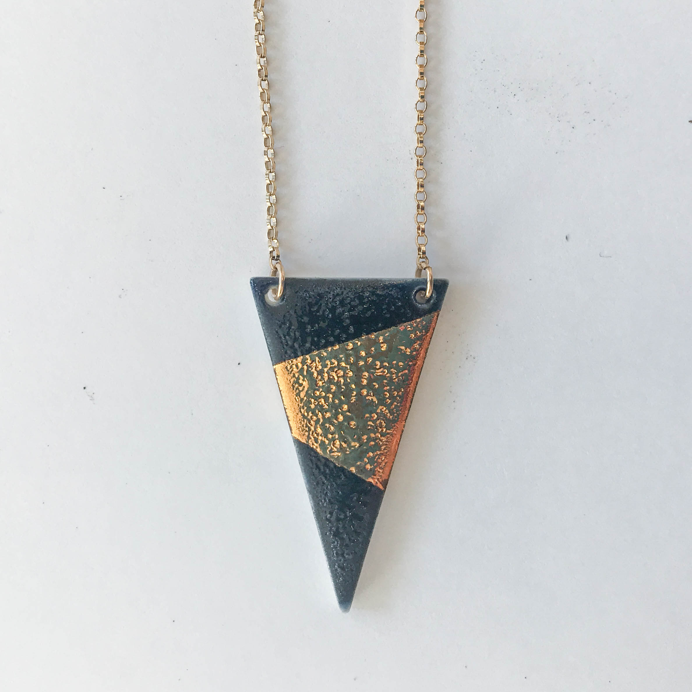 Midnight blue narrow triangle necklace, porcelain with midnight blue glaze and gold luster, 14K gold filled chain, $60