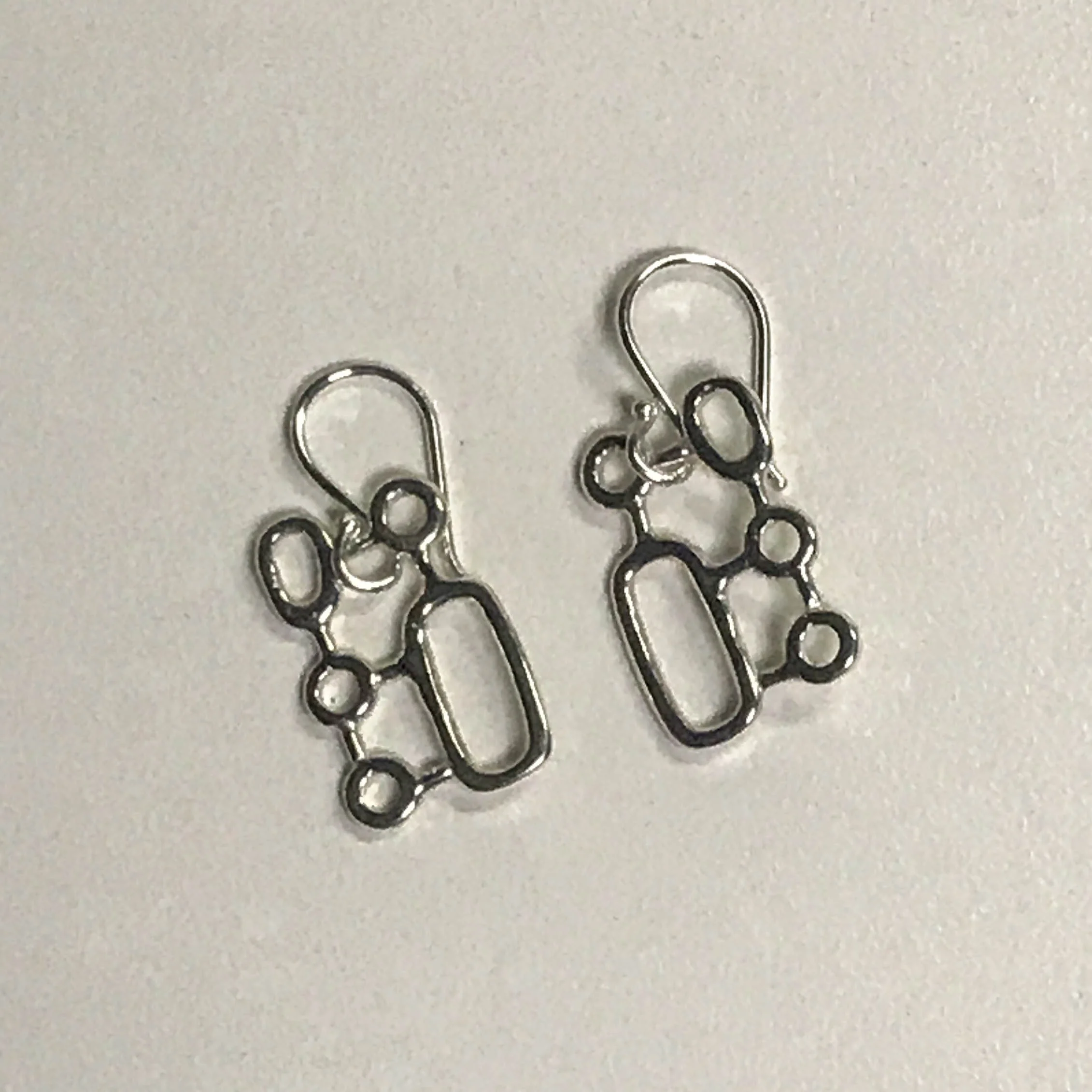 Organic geometric dangle earrings, sterling silver, $65