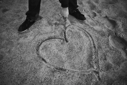 man-beach-love-sand-medium.jpg