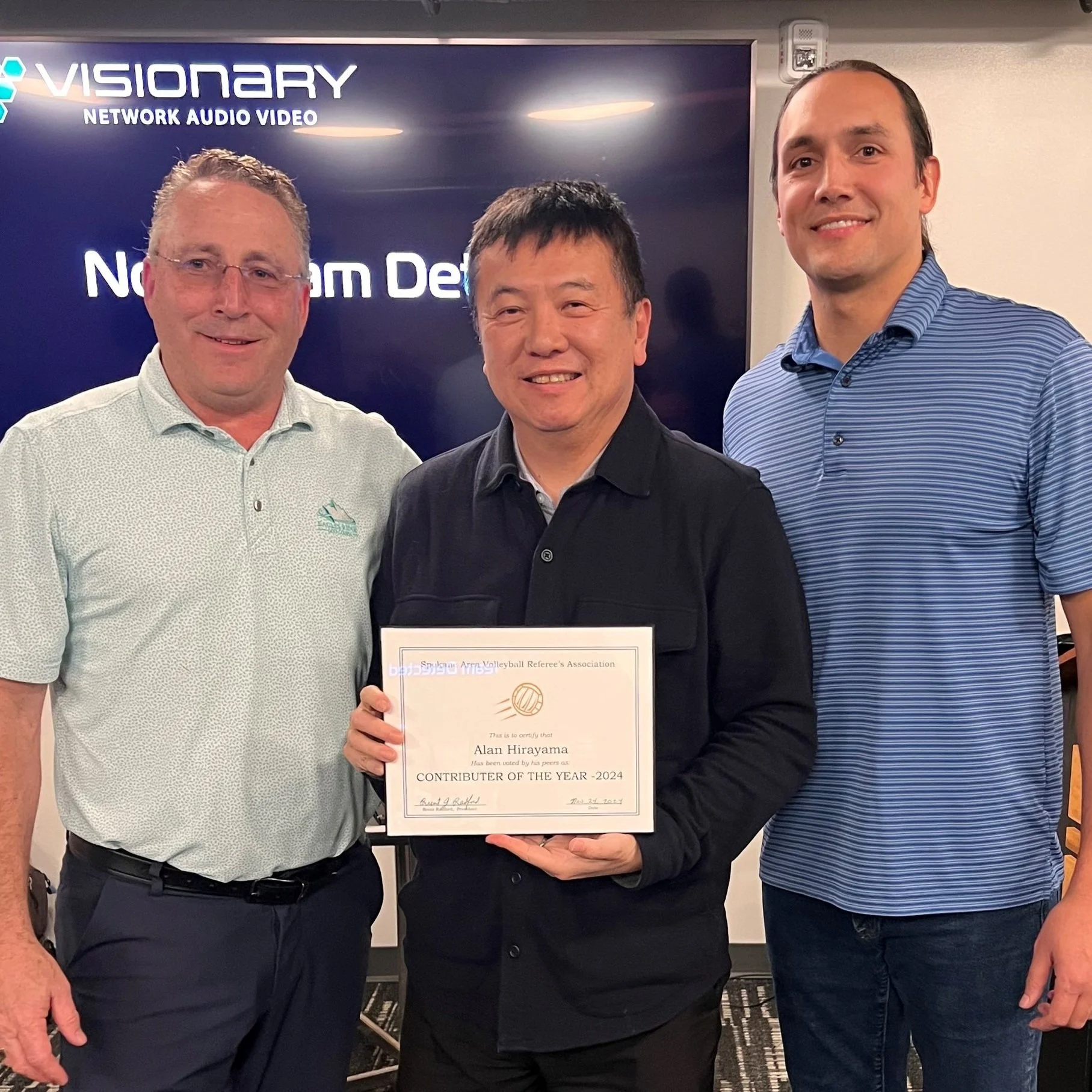 Contributor of the Year Alan Hirayama (center)